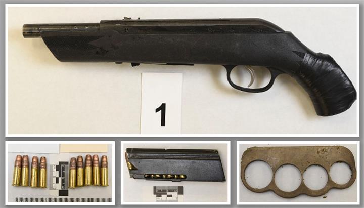 邻里冲突牵出枪支案件：警方在男子包中发现上膛霰弹枪1