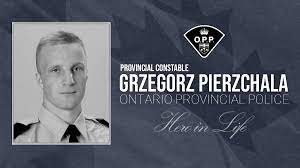 刚刚通过试用期的警察在周二被枪杀1 刚刚通过试用期的警察在周二被枪杀1